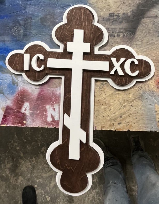 Orthodox cross with IC XC lettering, stained walnut face over a white backer