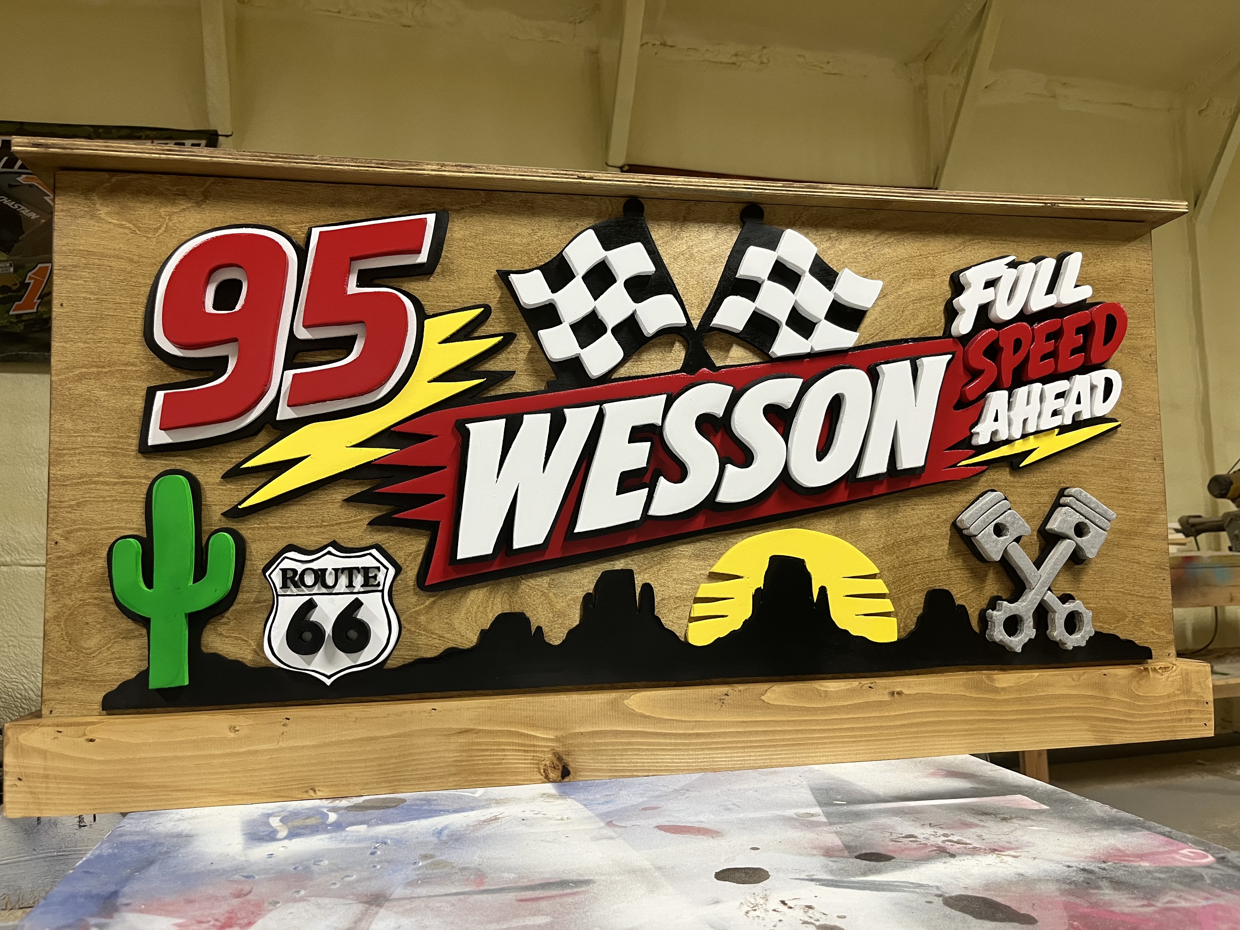 'Wesson' racing toy box, #95, checkered flags and a desert skyline