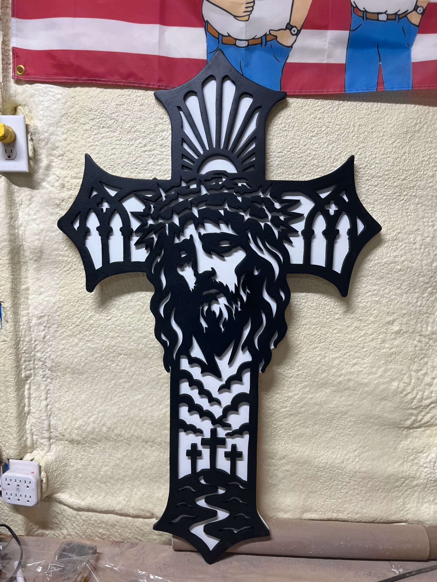 Gothic arch cross with cathedral windows, a layered face and a stained frame, one of the most detailed pieces the shop builds, example of custom handmade wood work