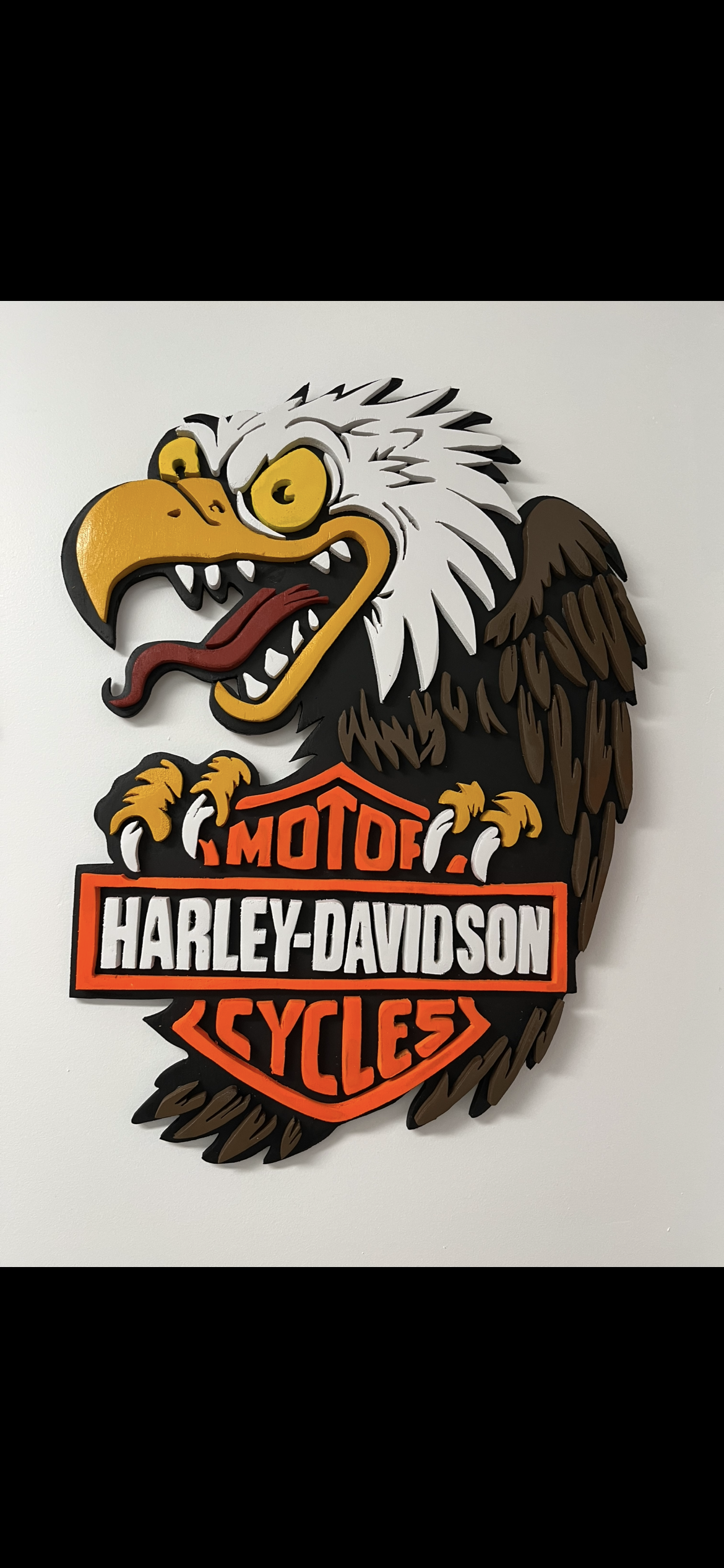 Screaming eagle bar and shield, feathers cut one layer at a time