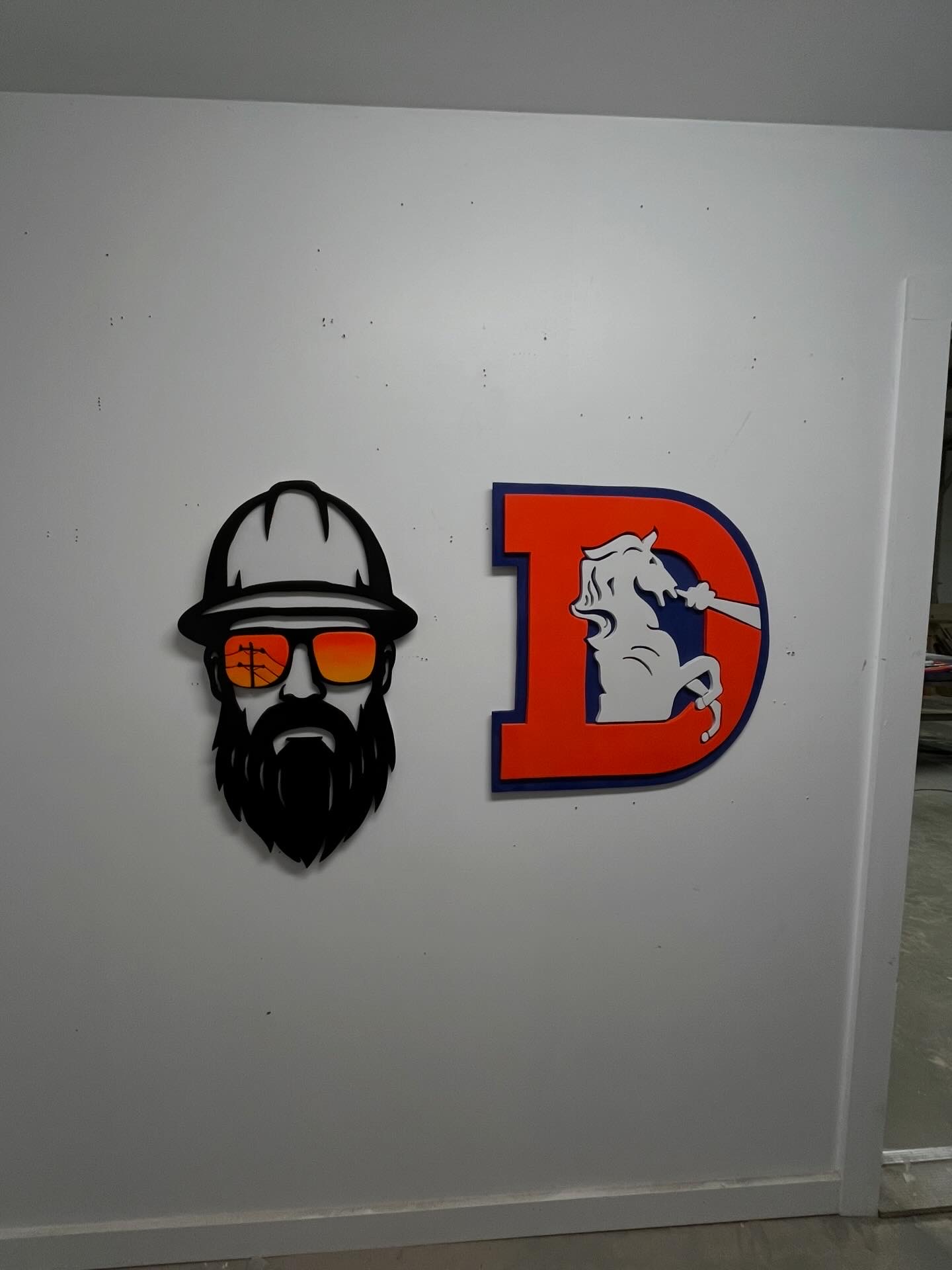 Broncos 'D' with the mascot inlaid, cut and layered by hand