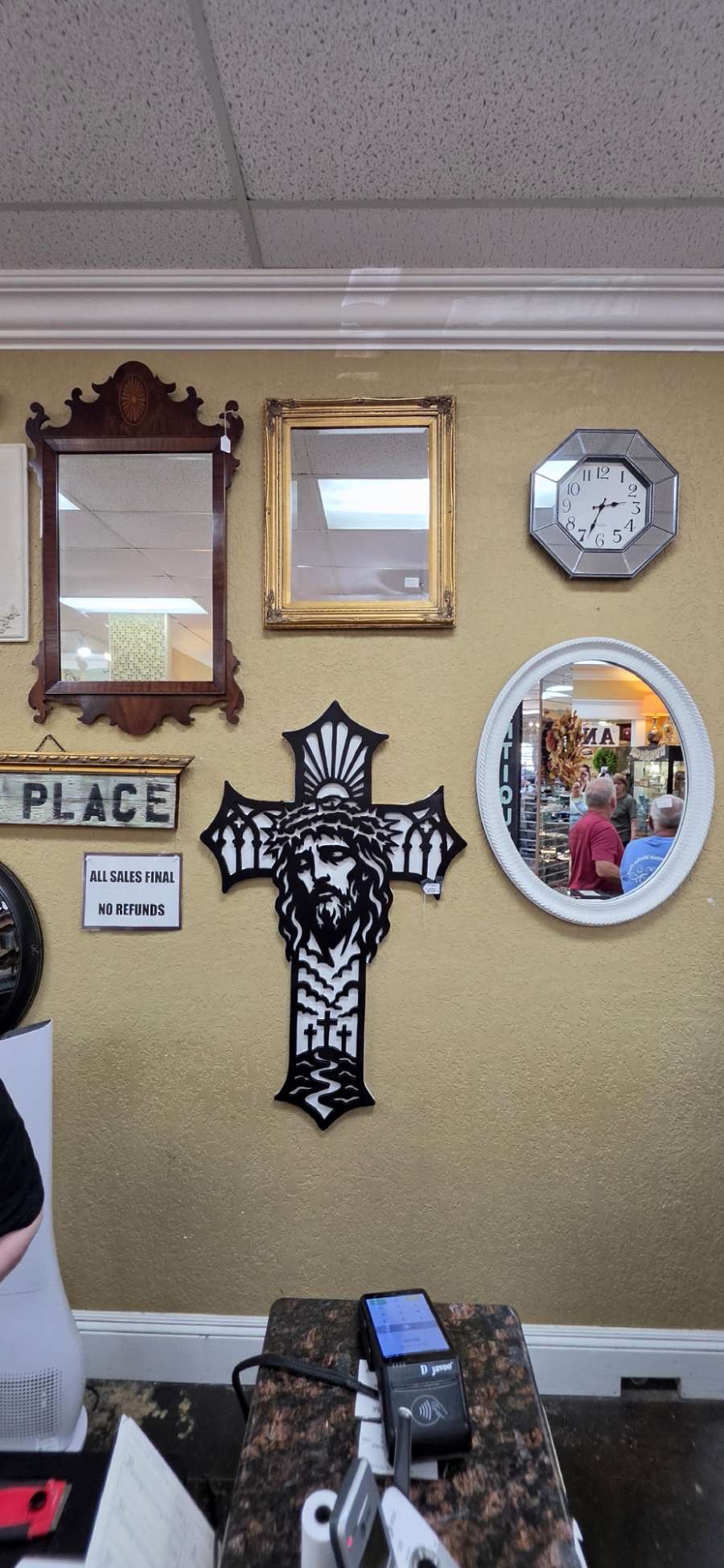 Fretwork cross with the face of Jesus, cut line by line on the jigsaw and hung at our booth.