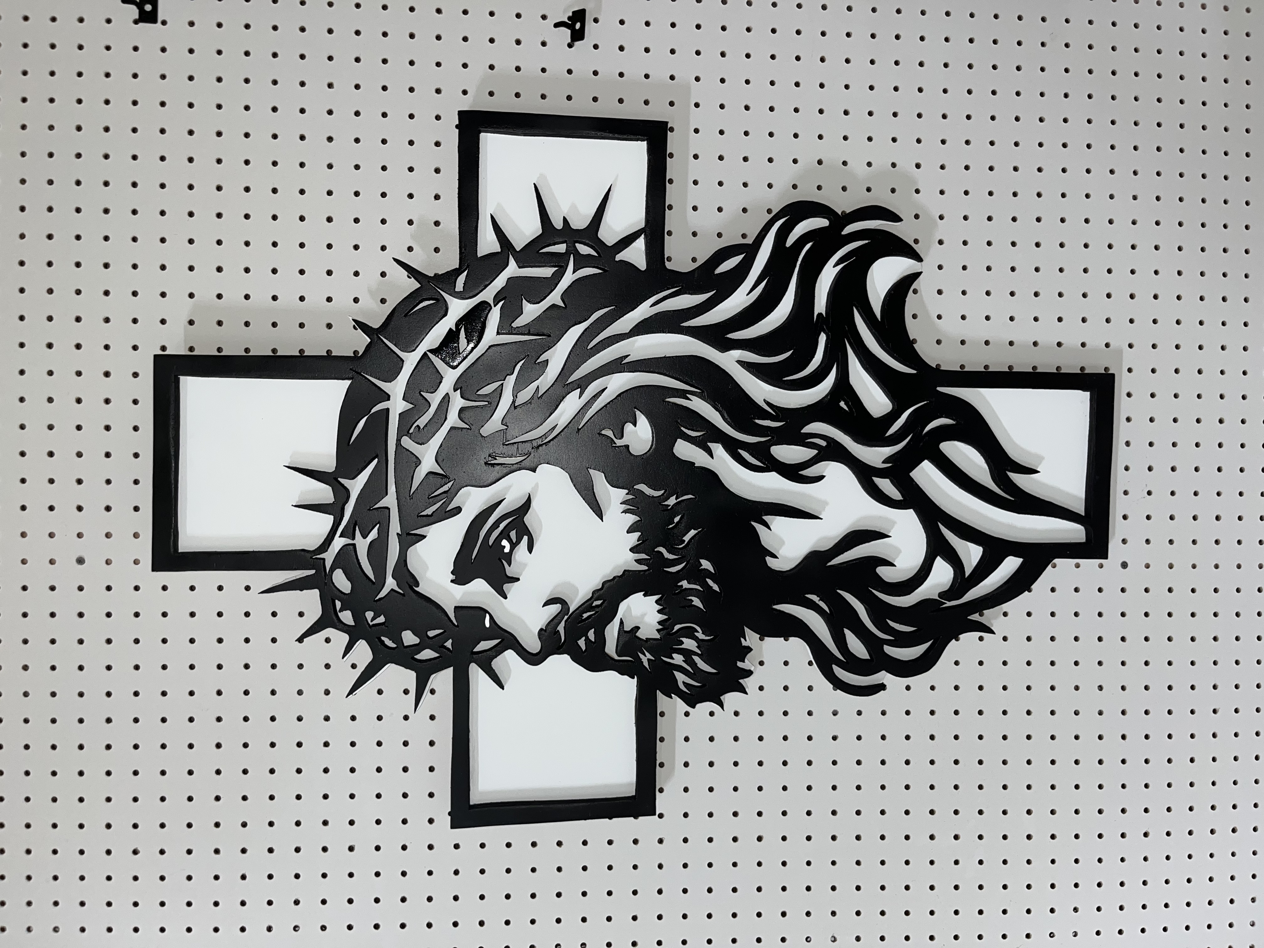Portrait cross of Jesus in black and white, fresh off the bench